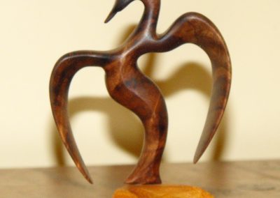 Dancing Loon Carved from Walnut and Maple