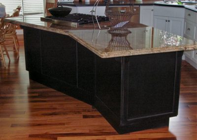 Maple Kitchen Island with distressed black finish with granite counter top