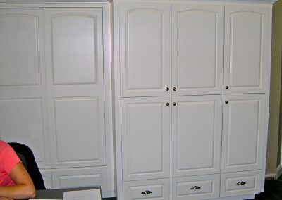 Portion of painted maple office cabinetry