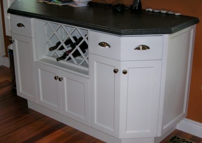 White Painted Maple Kitchen Cabinetry with Corian Top