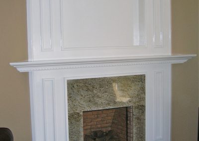 White painted Maple Fireplace Mantle with all custom moulding