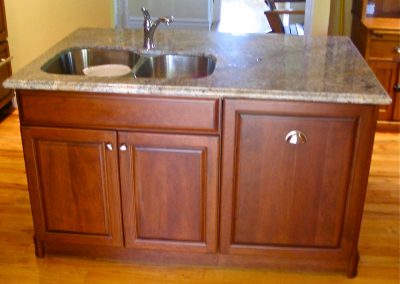 Working side of Cherry Island with built-in dishwasher